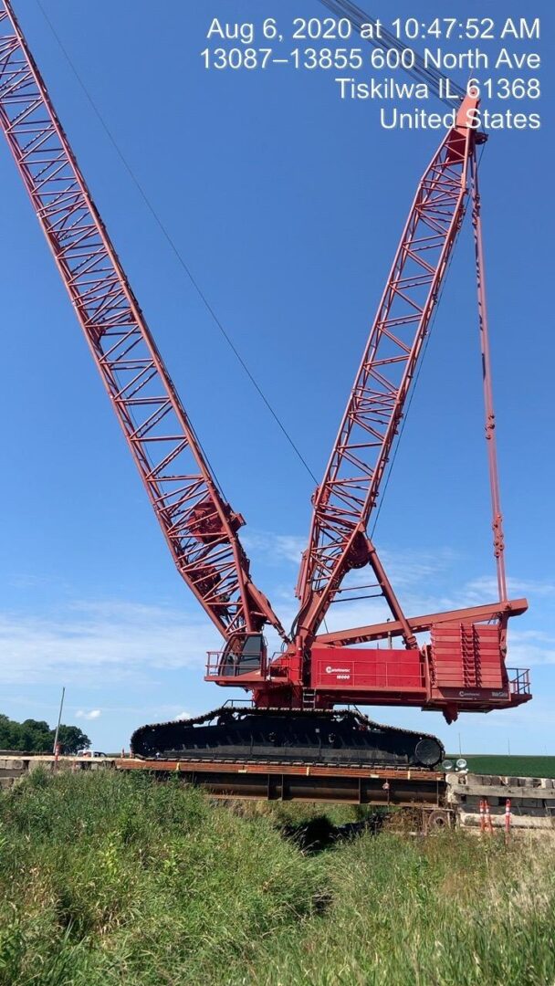 A red color construction crane at Tiskilwa